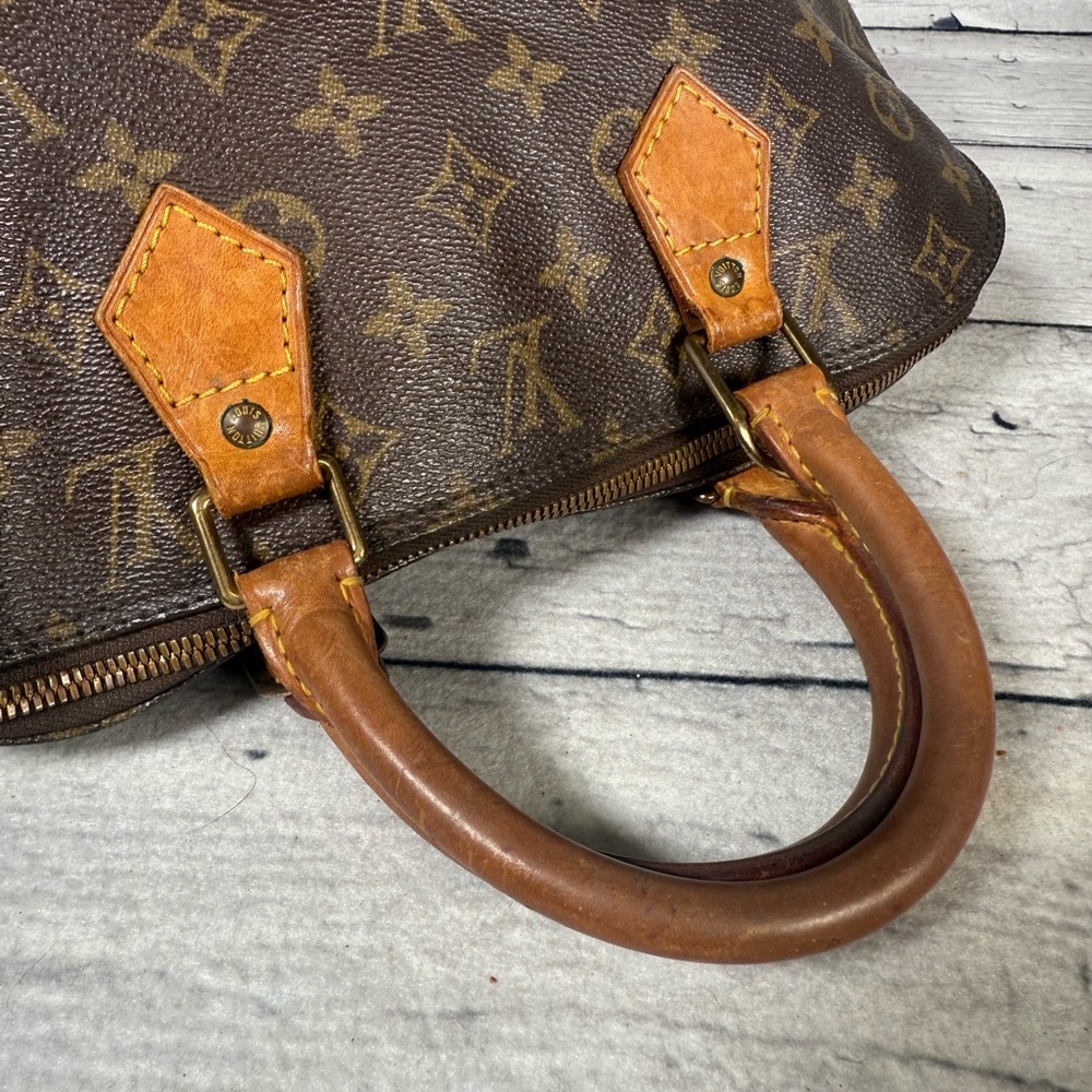 Louis Vuitton Alma Brown Monogram Leather Canvas Handbag - Picture 5 of 16